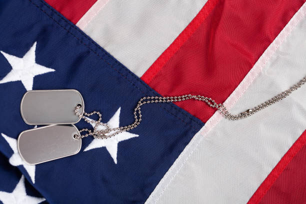 istock US army dog tags on USA national flag 1785775897