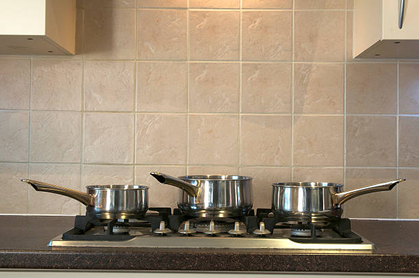 istock cooking pans on gas hob 178577982