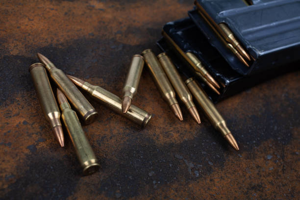 istock Ammunition with magazine on rusty metal 1785782865