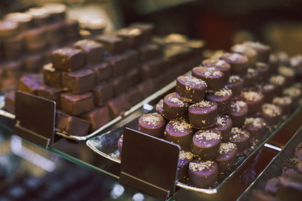 istock Delicious candies on a plate in a chocolate shop. 1785786182