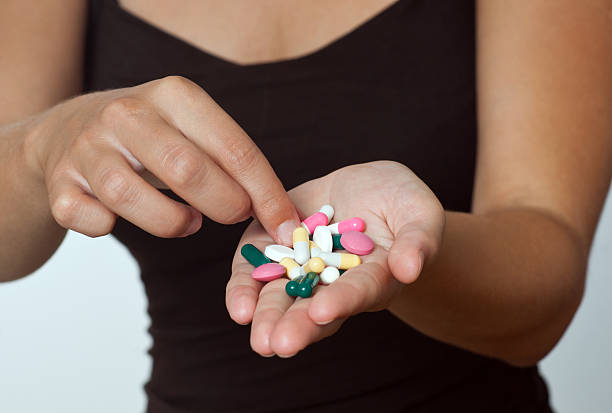 istock handfull of pills 178578873