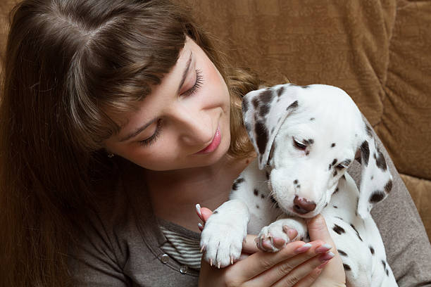 istock Girl and puppy 178578952