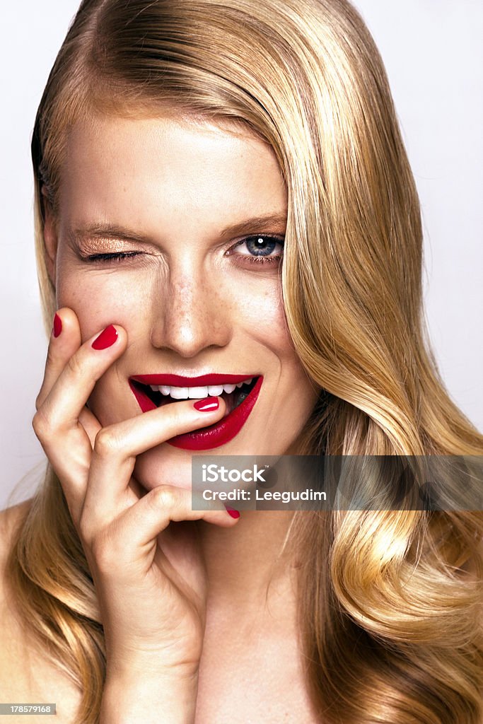 beautiful cheerful woman studio portrait of beautiful smiling woman with bright make-up Women Stock Photo
