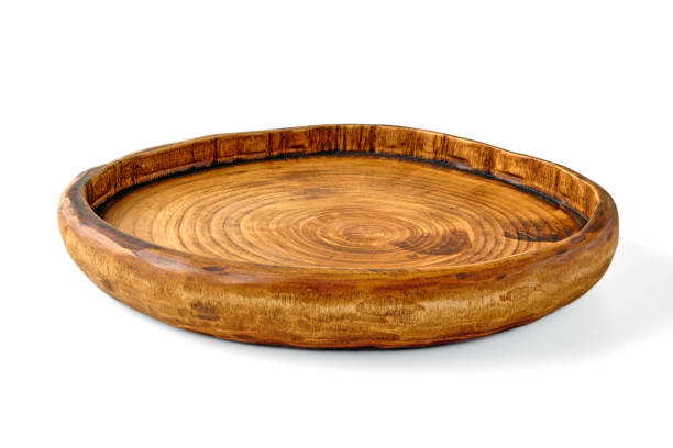 istock Handmade wooden brown plate isolated on white background. High angle view 1785801493