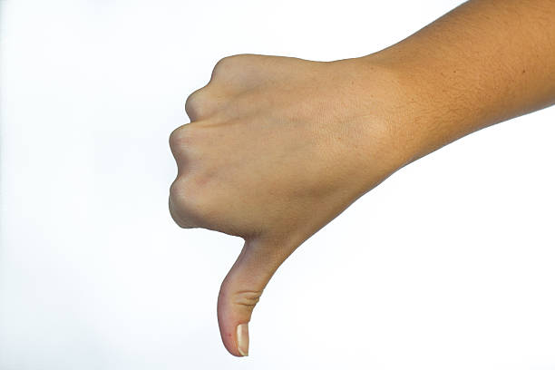istock Thumbs down hand in the air 178580226