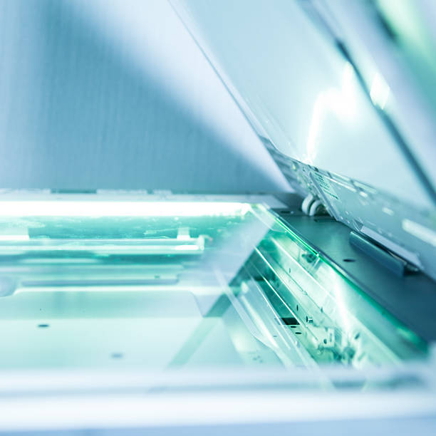 istock A close-up of an open copy machine 178580472