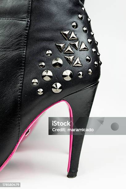 Female High Boots With Spikes Isolated On White Stock Photo - Download Image Now - Black Color, Boot, Cleats