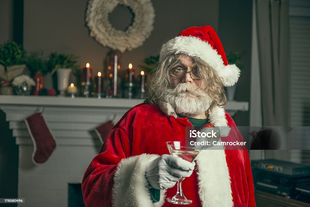 Bad Santa Gets Wasted This santa just wants to party.Vintage film style processing. Santa Claus Stock Photo