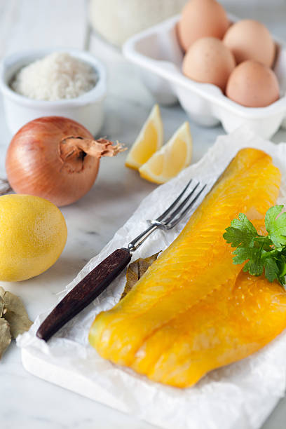 Smoked Haddock & kedgeree ingredients Smoked Haddock & kedgeree ingredients - shallow dof haddock stock pictures, royalty-free photos & images