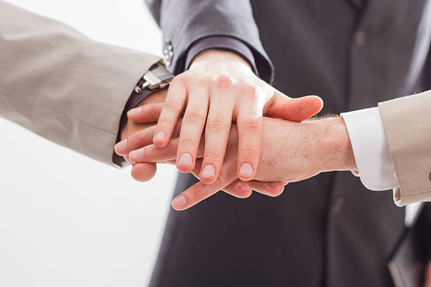 istock Close up of people that hold hands together. 178580779