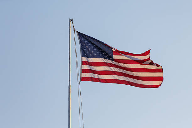 istock American Flag Blowing in Breeze 178581990