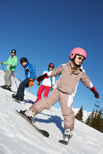 istock Family On Ski Holiday In Mountains 178582012