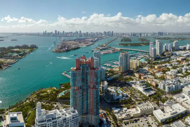 Photo of Miami Beach city in southern Florida, USA. High luxury hotels and condominium buildings. High angle view of tourist infrastructure in United States