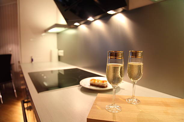 Modern kitchen and champagne stock photo