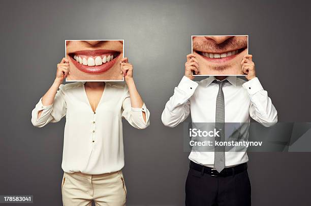 Man Holding Pictures With Big Smile Stock Photo - Download Image Now - Adult, Concepts, Concepts & Topics