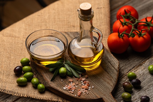 olive oil, olive oil concept on wooden background