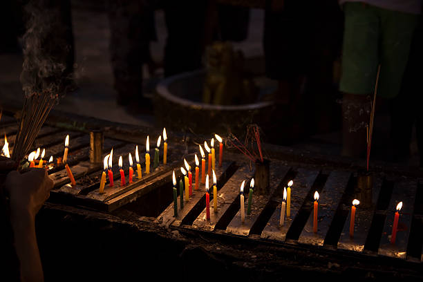 istock Myanmar, votive candles in the temple 178584261
