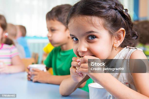 Cute Little Children Drinking Milk Stock Photo - Download Image Now - Child, Eating, Snack