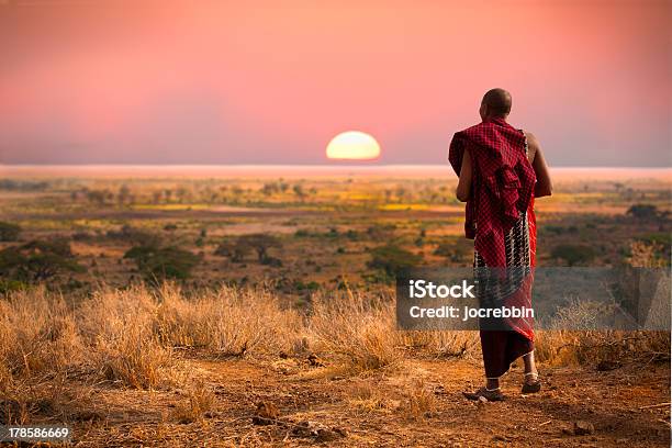 Masai Warrior At Sunset Stock Photo - Download Image Now - Tanzania, Africa, Maasai People