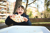 preschool girl on a picnic in a park.