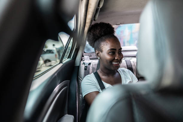 istock Young woman on a taxi 1785869648