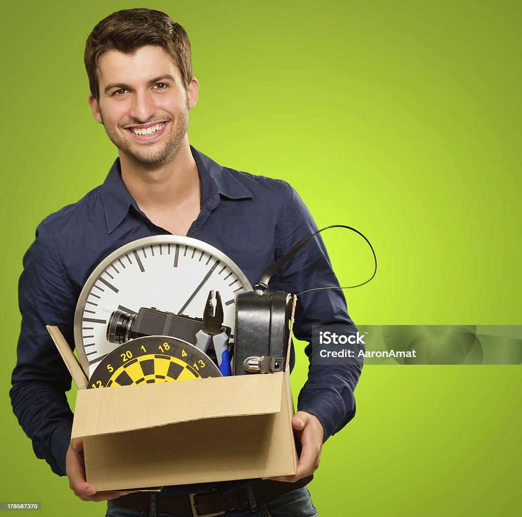 Homem segurando objetos - Foto de stock de Adulto royalty-free