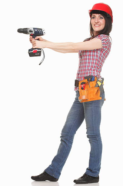 istock Woman with electric screwdriver in hands 178587401