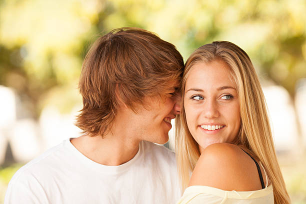 istock young beautiful couple enjoying a day on the park 178587462