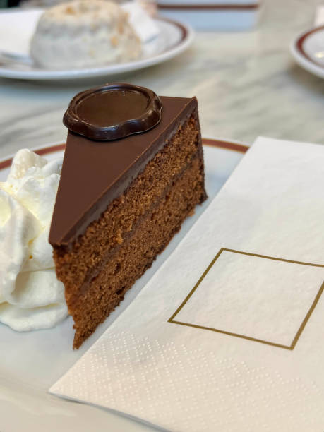 istock Side view slice of chocolate cake on table in a Cafe 1785881157