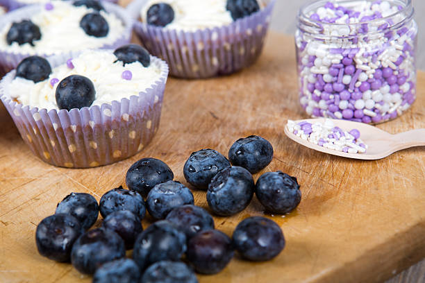 istock Delicious cupcake with blueberries, cream and fresh berries 178589140