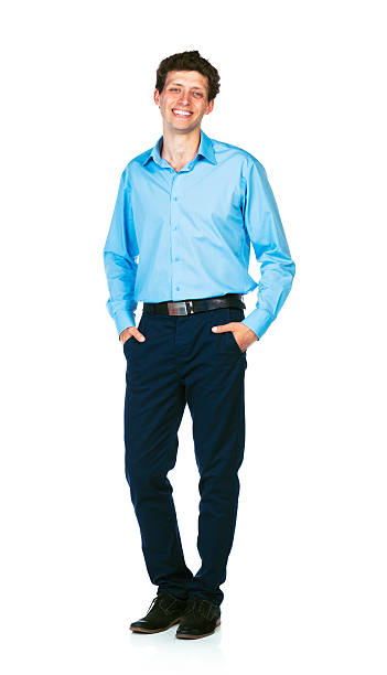 istock Happy young businessman standing with his hands in pockets 178589248