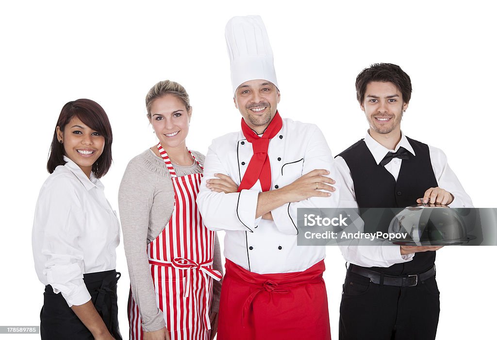 Gruppo di chef e camerieri - Foto stock royalty-free di Adulto