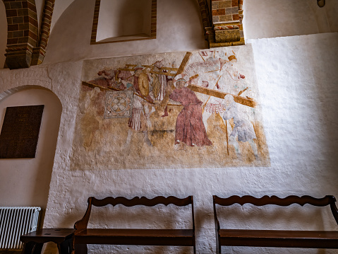 Sorø, Denmark - November 9, 2023: Christ carrying the cross. Fresco from around 1450-1500 in Sorø Klosterkirke - Monastery Church.