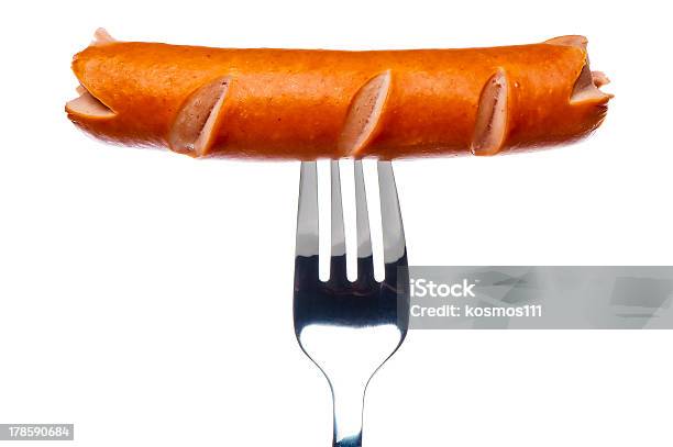 Cooking Sausage On Fork Stock Photo - Download Image Now - Fork, Grilled, Sausage