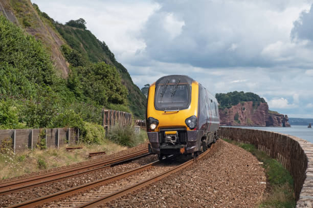 istock A passenger train on the coastal approach to Teignmouth in Devon, UK 1785907829