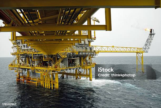 Gas Flare Is On The Oil Rig Platform Stock Photo - Download Image Now - Blue, Construction Industry, Exploding