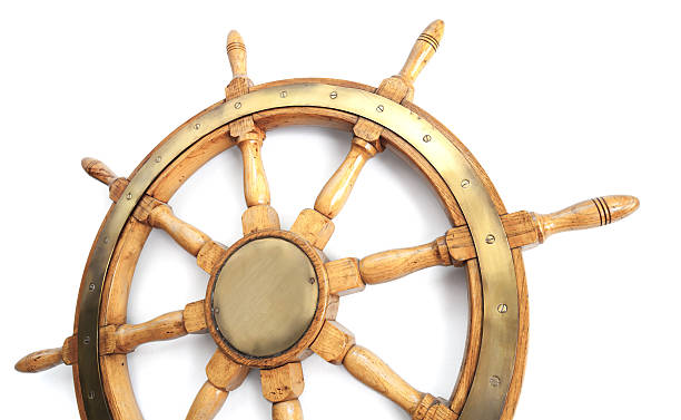 istock Old wooden steering wheel on white background 178593628