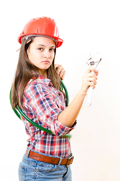 istock Woman holding Adjustable Wrench 178594060