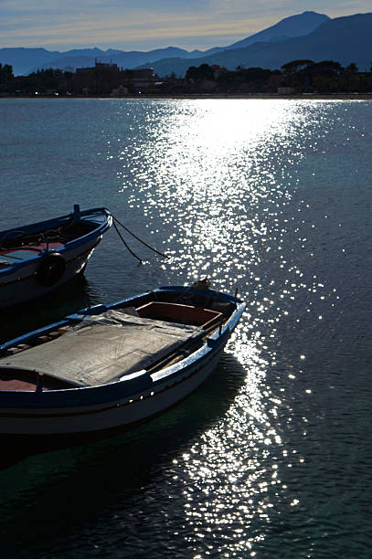 Fishermen Boats in backlight stock photo