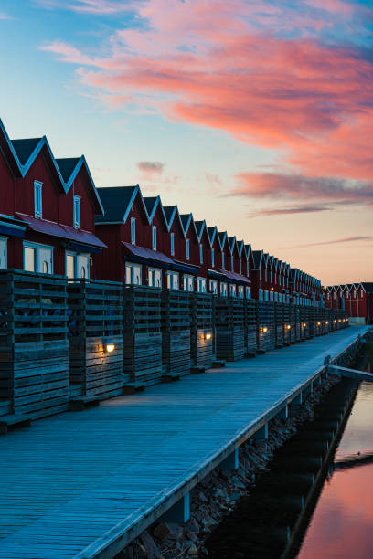 istock Harbor Reflection at Dusk: Architecture and Cottages on the Waterfront 1785962635
