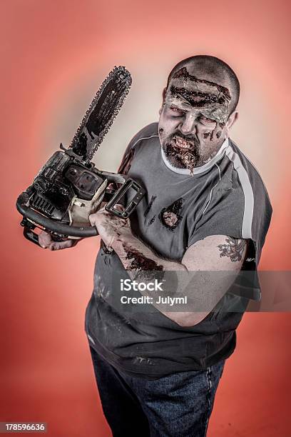 Zombie With Mechanical Saw Stock Photo - Download Image Now - Bizarre, Dark, Electric Saw