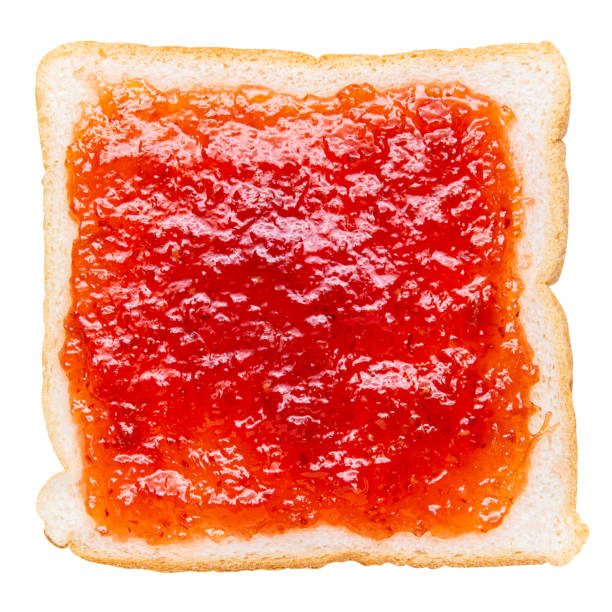 istock Spread strawberry jam on a slice of bread 1785969421