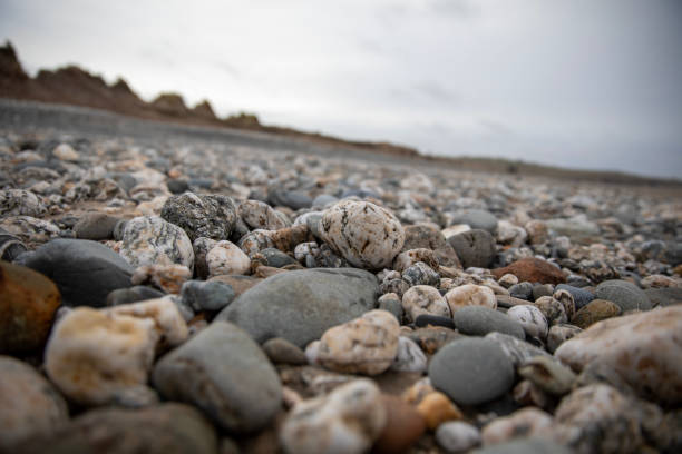 Close up black pebble beach