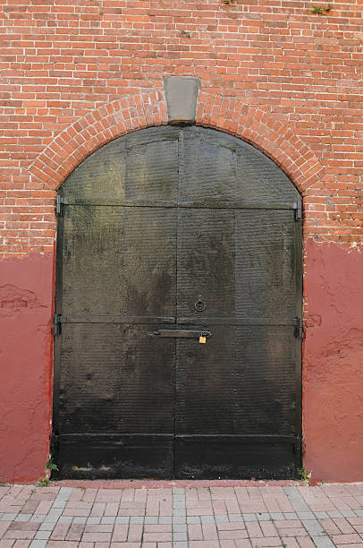 istock red brick building with black doors 178598101