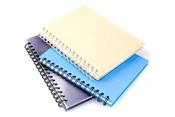 stos segregator książki i notebook na białym tle - spiral notebook spiral ring binder blank zdjęcia i obrazy z banku zdjęć