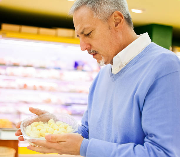 istock Man shopping in a supermarket 178598308