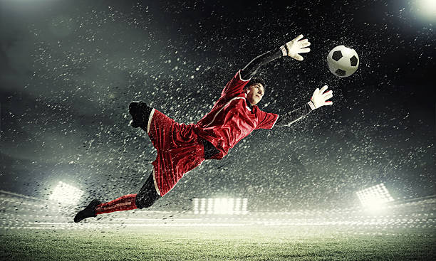 istock Goalkeeper catches the ball 178599561