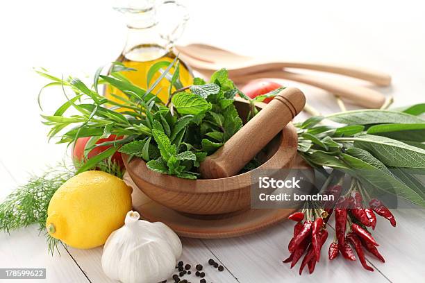 Fresh Herbs With Mortar And Pestle Stock Photo - Download Image Now - Aromatherapy, Cooking Oil, Dill
