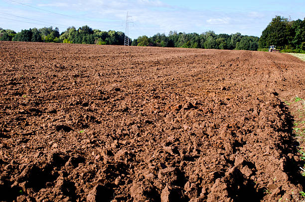 istock plowed autumn farm field 178600060