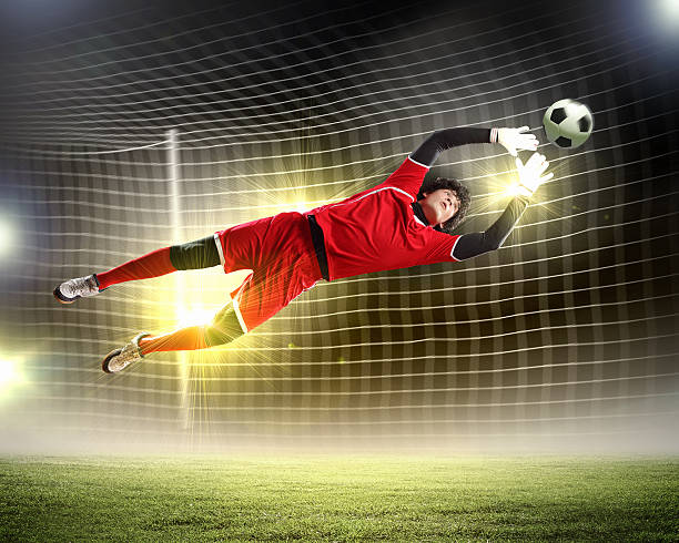 istock Goalkeeper catches the ball 178600092
